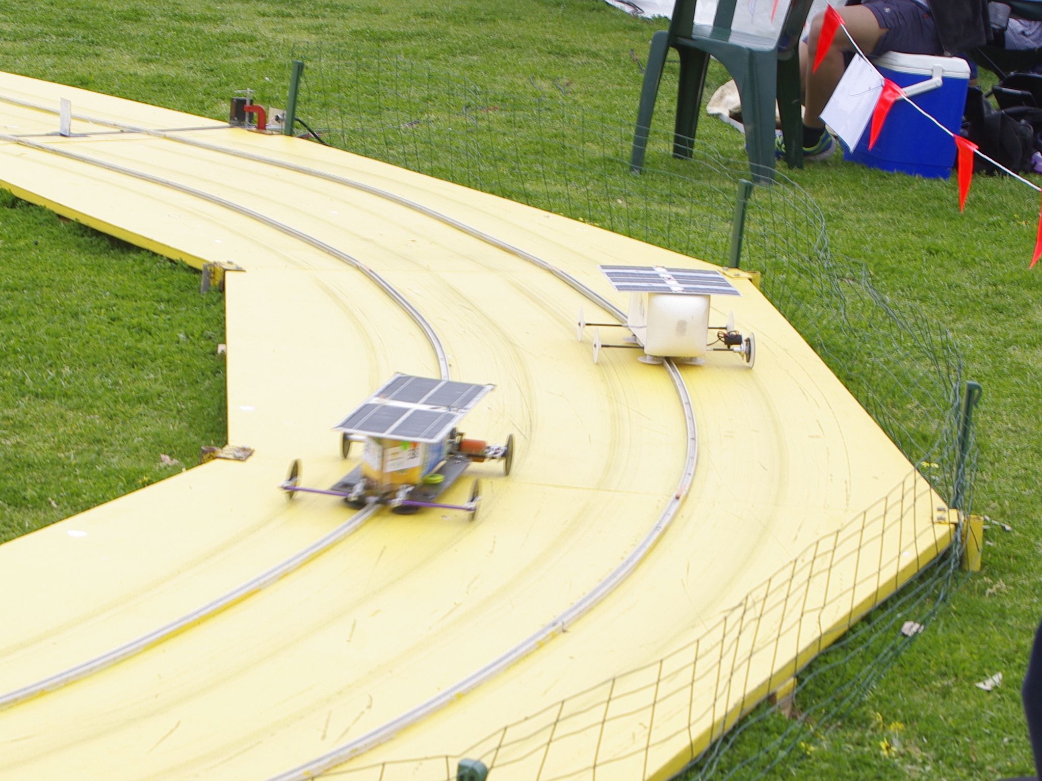 Humpty 05 (left) racing in the 2016 Victorian Model Solar Vehicle Challenge
